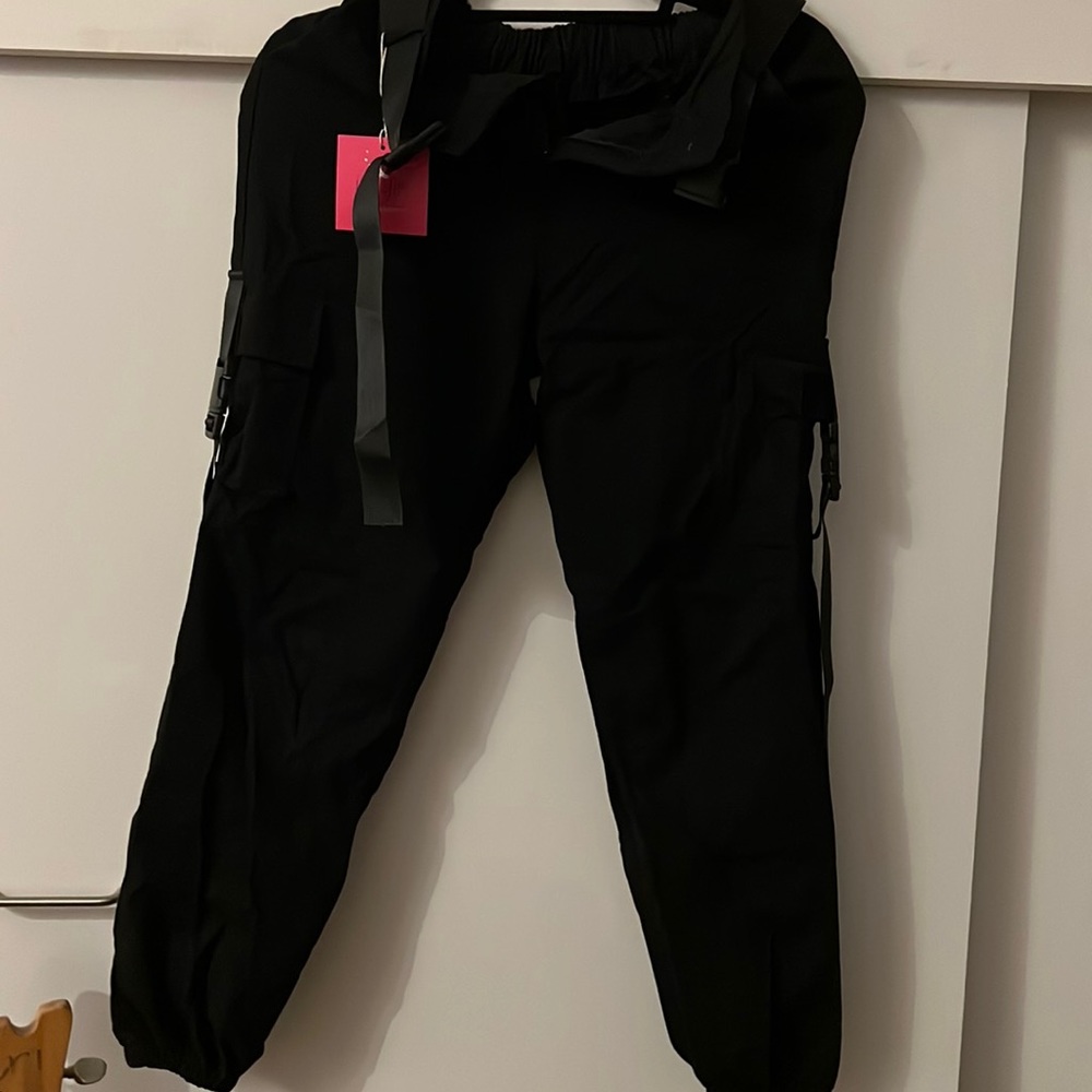 Black joggers with belt buckle detailing